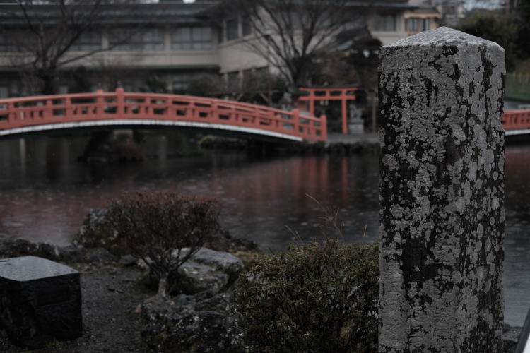 Foot bridge across Wakutama Pond in the rain, a spot near Mount Fuji