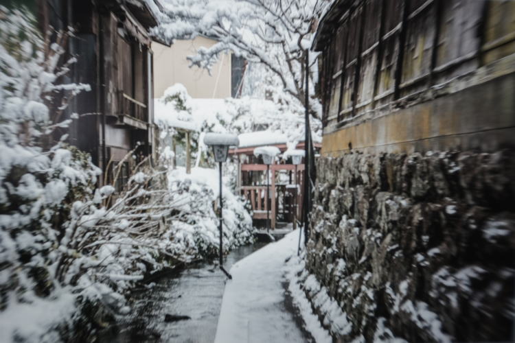 Water canal covered with snow in Gujo Hachiman