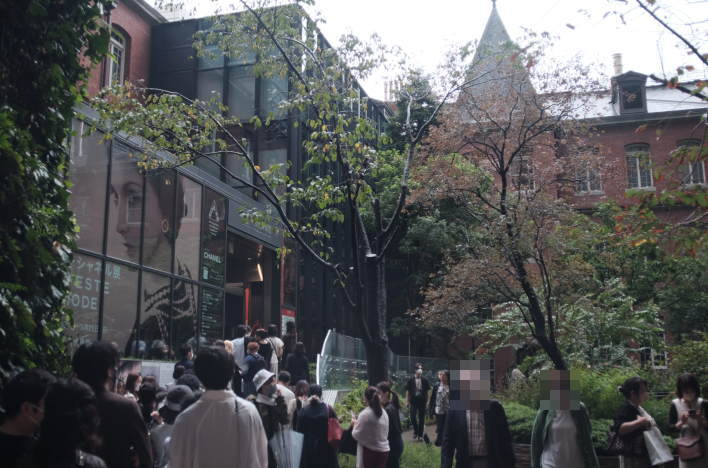 People queue up to see the Gabrielle Chanel exhibition at Marunouchi Brick Square. 