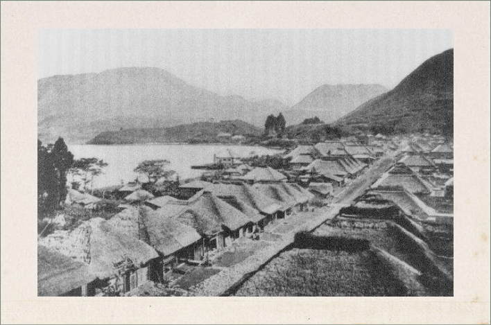Hakone lake and village, with the Emperor's palace in the distance.
